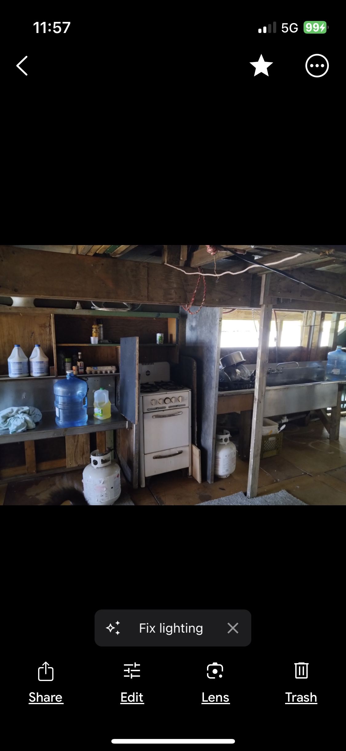 Kitchen with gas stove and stainless sink