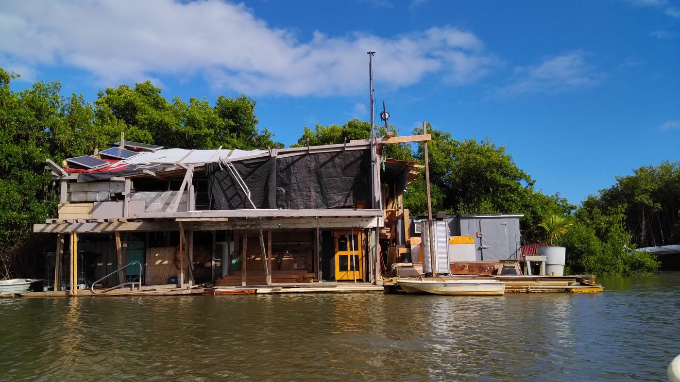 The floating home viewed from the south side of the river